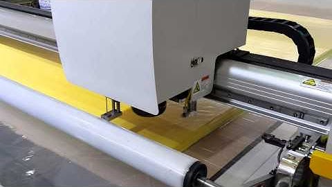 How OSHIMA Automated Fabric Cutting Machine Work?