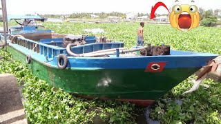 [739] Water hyacinth is dense at the gate of the dam, making it difficult for boats