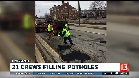 DPW Filling Potholes