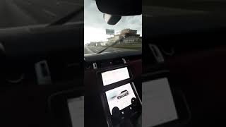 Driving Range Rover Sport 2020 through rain storm