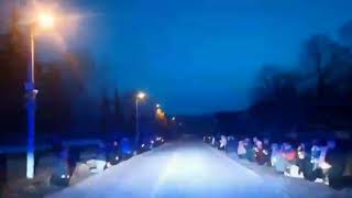 Villagers Are Standing On Knees Giving Tribute to a Fallen Ukrainian Soldier.