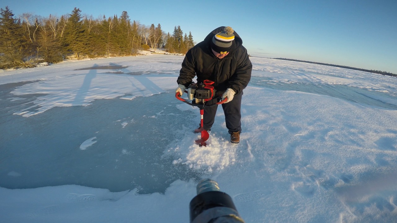 Lowering a GoPro down a few ice fishing holes in Shaol Lake Ont.