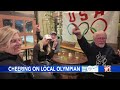 Chris Lillis' family gathers at Fairport Brewing Company, celebrating his Olympic participation