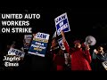 Workers go on strike at all Big 3 Detroit automakers for the first time in history