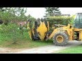 Dutchman 80" Spade digging trees at Spring Creek Golf Club