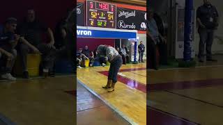 Person Wearing Wolf Mask and Gloves Takes a Tumble While Walking