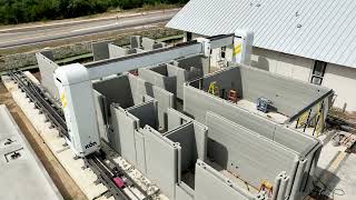 a fleet of robots has built the largest community of 3D-printed homes outside austin