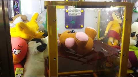 Maddox playing Trap Door at arcade Dave & Busters