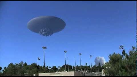 Flying Saucer over buildings fires death-ray FX