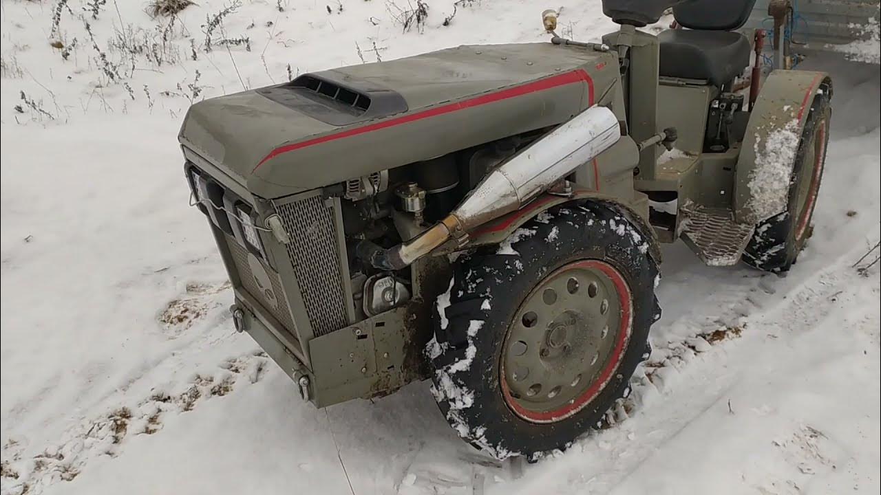 Трактор тянет прицеп. Загрузил в прицеп тонну.