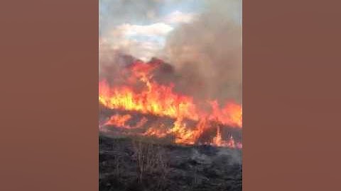 Burning farmland Hynek 2012