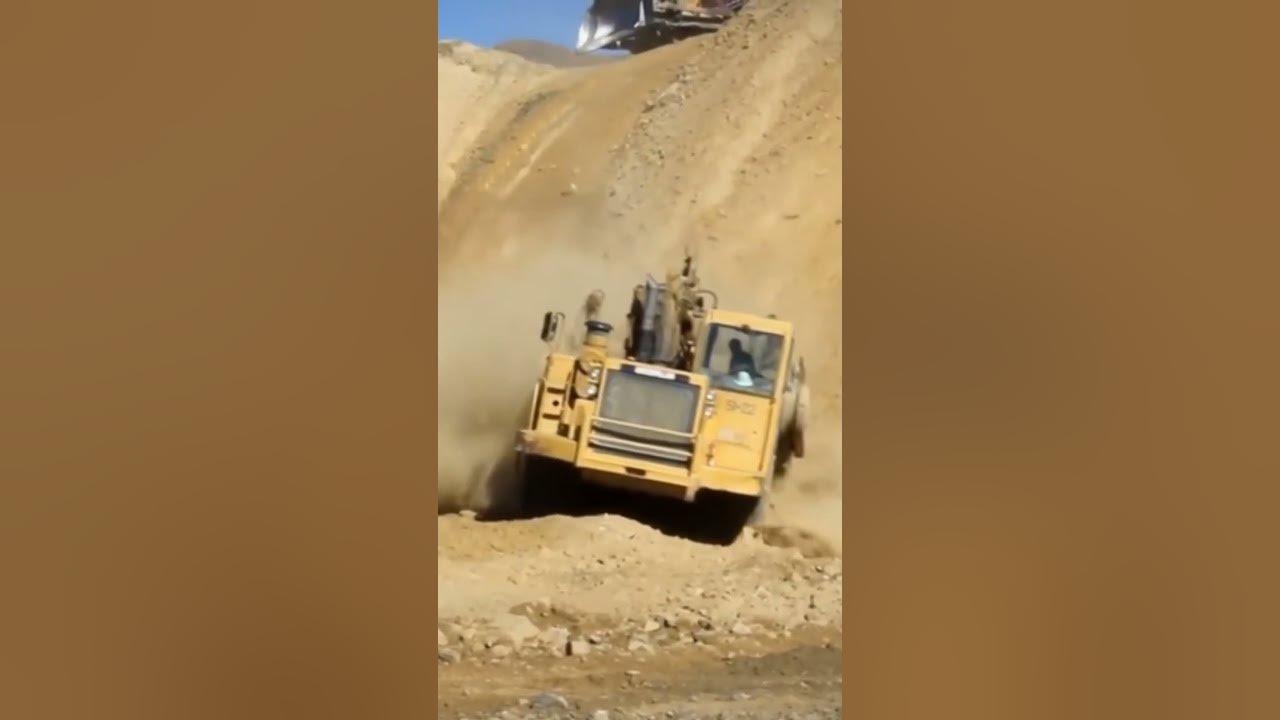 CAT 657G scraper storming down a steep hill! #shorts #shortsfeed