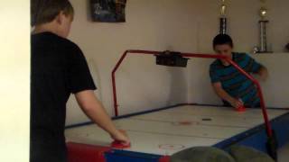 Idiots playing Air hockey screenshot 2