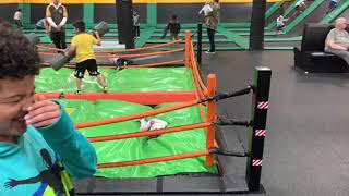 Girls jumps in boxing ring and lands in scorpion position