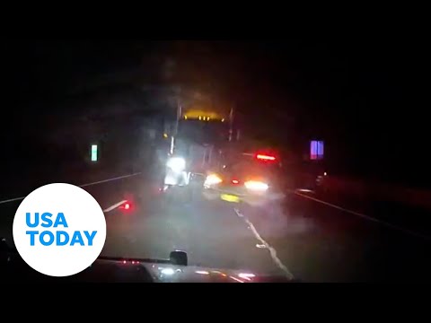 Dashcam records semi-truck slamming into police vehicles in New Jersey | USA TODAY