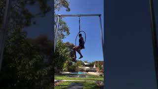 Woman Performs Aerial Acrobatic Moves Using Hula Hoop - 1498495-2