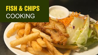 Traditional English Foods: Fish and Chips made with Haddock, Sweet Potatoes, Asparagus