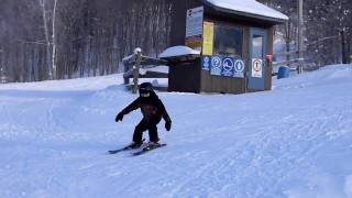 Riley skiing the half pipe