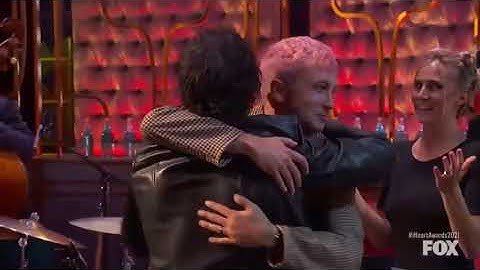 tyler and josh ignoring their wives to hug each other