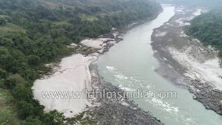 Sand bars, step cultivation of rice, village farming and thick rain
forest all come together to create the landscape arunachal pradesh,
along siang ri...