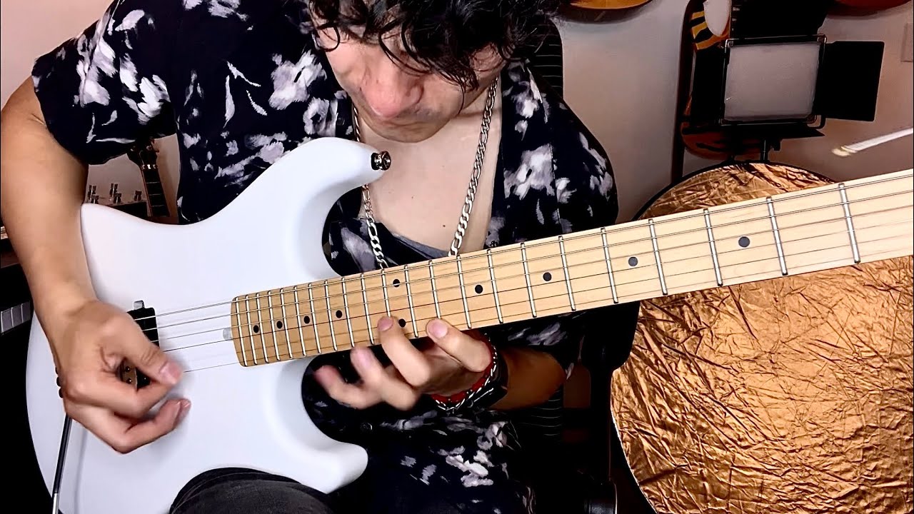 Qué hace  Marty Friedman en Tornado of Souls (escalas, armonía, modulaciones)