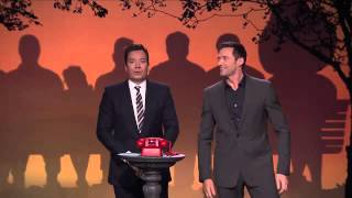 Phone booth with Hugh jackman and shaquille o,neal