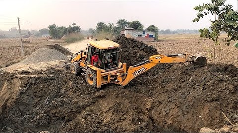 JCB Backhoe Loader Making A Bridge Foundation - JCB Dozar Video