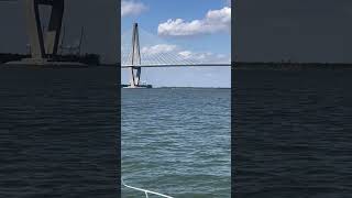 US warship getting towed into Charleston Harbor