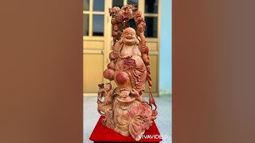 Phật di lặc vác cành đào, đứng trên bao tiền , gỗ hương già đã lên chun. Cao 90, ngang 50, sâu 35