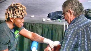 KSI getting his hands wrapped by the greatest cutman of all time, Stitch Duran