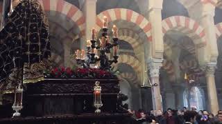 Parade entering Mosque-Cathedral, during The Holy Week of Cordoba, Spain