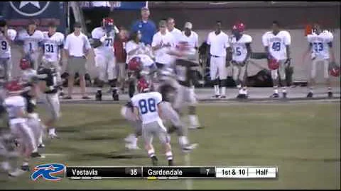 Stuart Jacobs of Vestavia almost breaks free on ki...