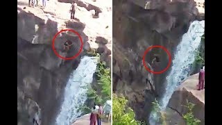 Horror as man falls 170ft to his d eath from Indian waterfall when pals told him to move