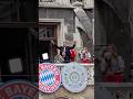 Joshua Kimmich lifting the Bundesliga trophy during Bayern's title celebration | Meisterfeier 2026