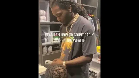 Offset teaching his son how to count money