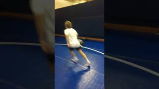 Boy uses friend as a step stool in attempt to dunk basketball into hoop but falls and lands on back