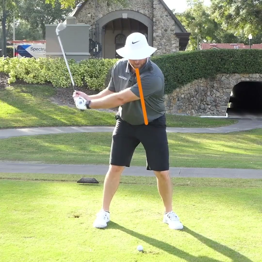 Spine Tilt for a mid-iron versus a wedge