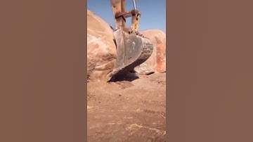 big stone Excavator working
