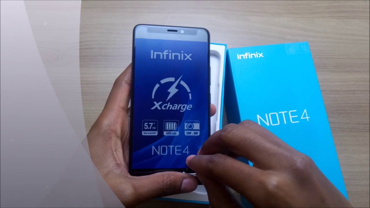 Реалми ноут 4. Infinix Note 4. Часы Инфиникс ноте. Коробка телефона марки Инфиникс в руке. Инфиникс нот 20 коробка.