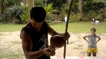 Professor Pimbal playing Iuna brimbau capoeira music