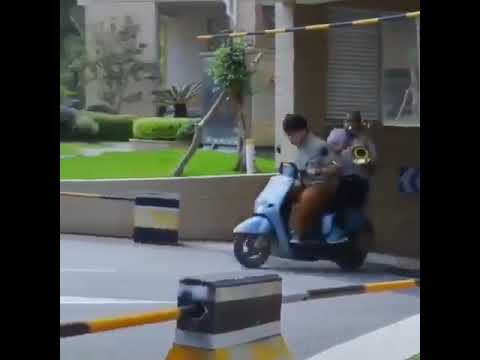 man-playing-trombone-on-motorbike