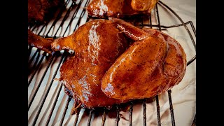 Chicken halves on the drum smoker