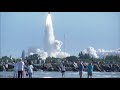 Spectators at Jetty Park in Cape Canaveral watch a Delta 2 rocket launching NASA’s GRAIL mission