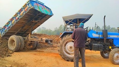 Sand Unload Loading On The Top Hills River Sand Loaded Tractor Digital Unload Facility Of Tractor |