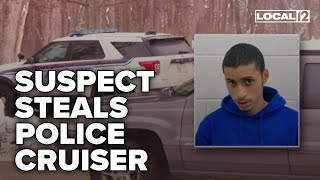 Suspect in stabbing gets away in stolen police cruiser: police