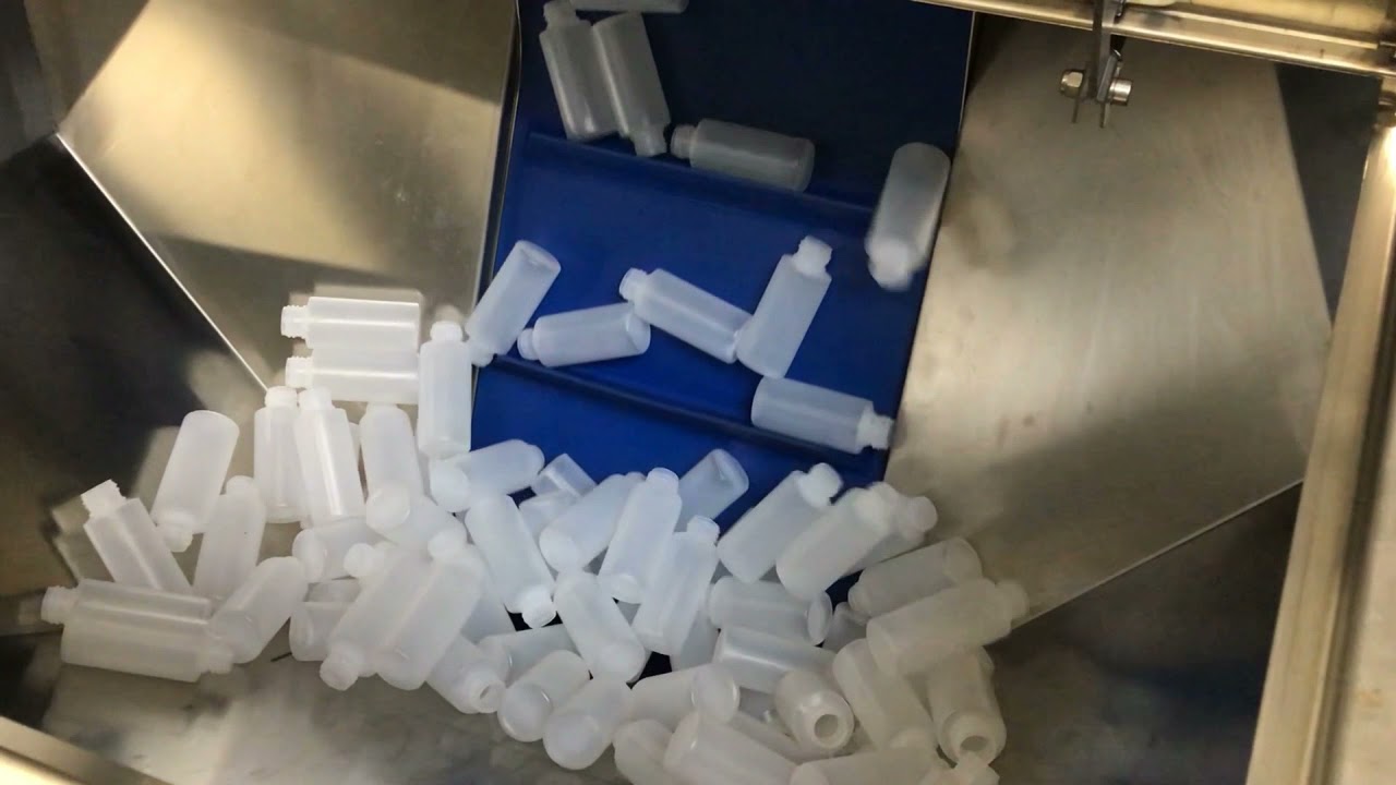 GMS Bottle unscrambler with separation tool. Posicionador de botellas con sistema paso a paso