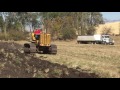 Turbocharged Caterpillar D7 plowing sod