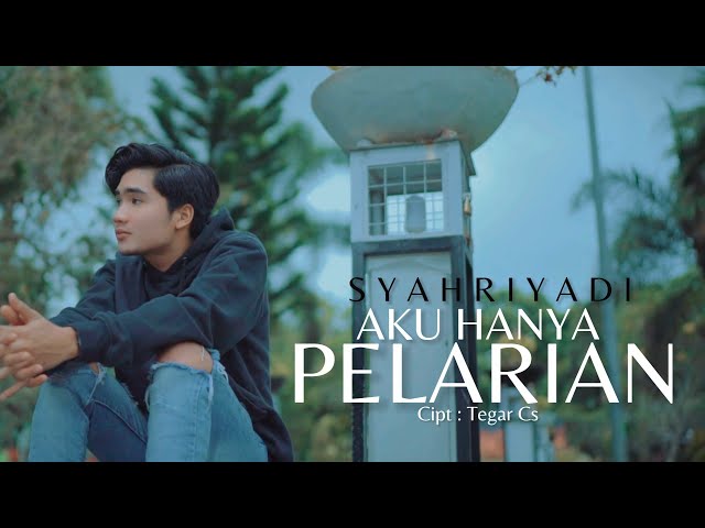 Syahriyadi - Aku Hanya Pelarian (Official Music Video) class=