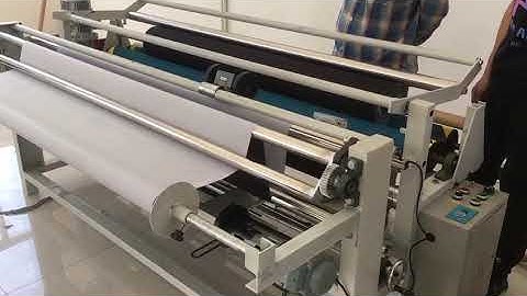 Automatic edge correction fabric rewinding machine