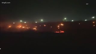 Brush fire and downed lines block traffic near Sumner as winds fuel fires across Washington